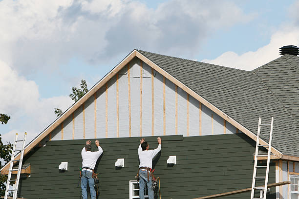 Professional Storm Damage Siding Repair technician working in De Leon Springs, FL